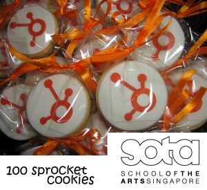 100 Sprocket logo round cookies